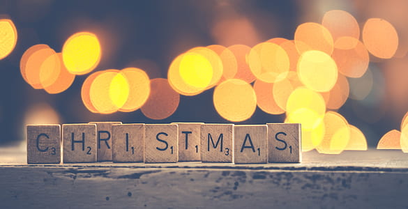 scrabble tile forming CHRISTMAS word bokeh photography thumbnail