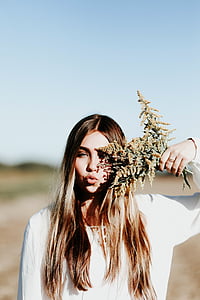woman holding flower bouquet while pouting thumbnail