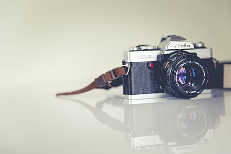black Minolta MILC camera thumbnail