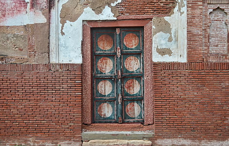closed black and brown wooden door thumbnail