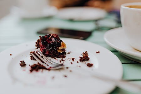 Drinking coffee and eating cake in a cafeteria thumbnail
