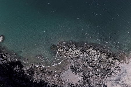 aerial photography of calm body of water thumbnail