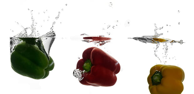 green, red, and yellow bell peppers on water thumbnail