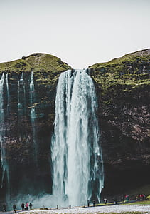 waterfall taken during daytime thumbnail