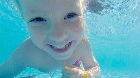 boy posing smile underwater thumbnail