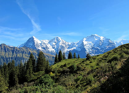 snow covered mountain alps view from across mountain range thumbnail