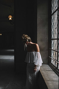 woman wearing white off shoulder floral long dress thumbnail