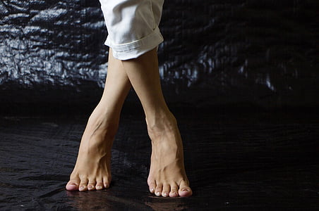 person's wearing white cuffed pants thumbnail