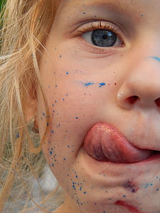 girl tongue out photo thumbnail