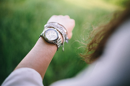 Silver watch on the girl's arm thumbnail