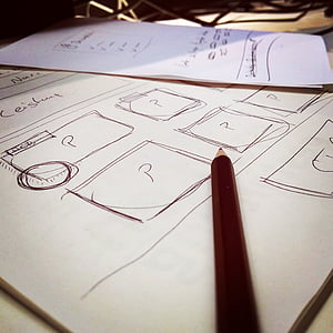 close shot of maroon pencil on white paper thumbnail