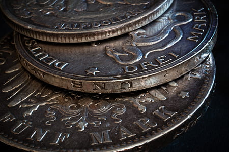 three silver-colored coins thumbnail
