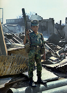 boy holding gun thumbnail