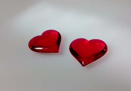 photo of two red heart gemstones thumbnail