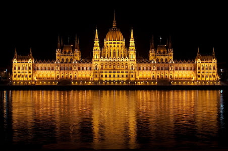 beige and brown palace beside body of water thumbnail
