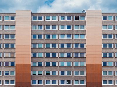 brown and white building thumbnail