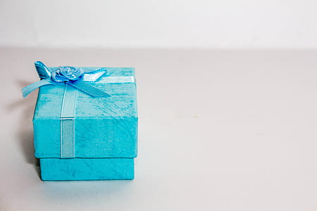 blue jewelry box on white surface thumbnail