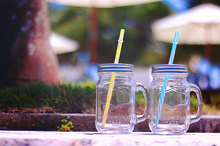 two clear glass mug jar with straw thumbnail