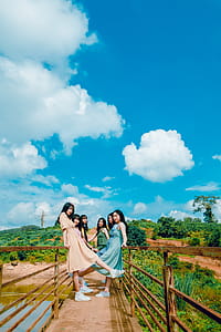 Six Girls Standing on Bridge thumbnail