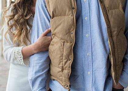 person wearing brown full-zip jacket thumbnail