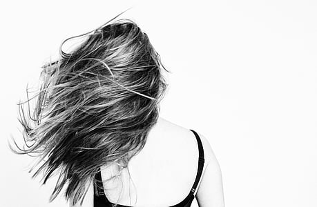 grayscale of woman wearing black spaghetti strap top thumbnail