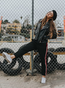 woman near to fence and wheels thumbnail