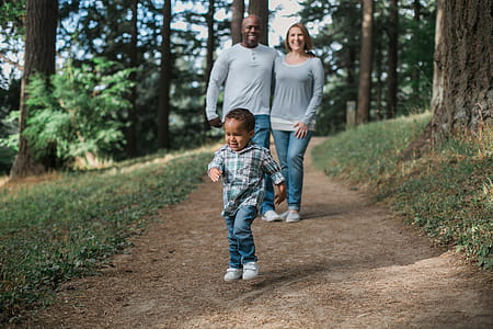 family dating under green forest trees thumbnail