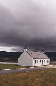white and black house on ground thumbnail