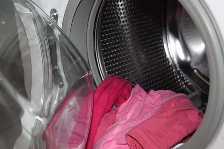 pink shirt in clothes washer thumbnail