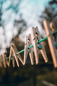 brown clothes clips hanged thumbnail