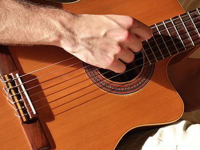 person playing acoustic guitar thumbnail