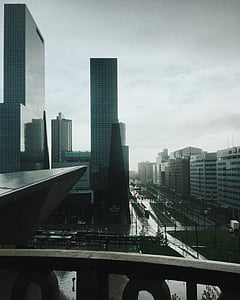 aerial photography of road between concrete buildings thumbnail