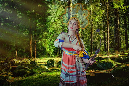 woman holding bow and arrow thumbnail