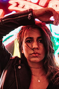woman wearing black leather jacket thumbnail