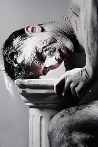 man with white body paint thumbnail
