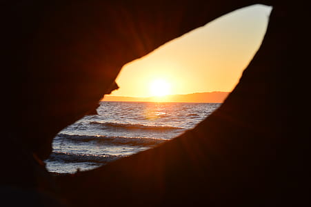 sunset as seen through hole thumbnail