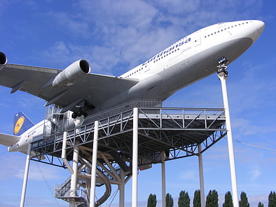 low-angel photography of airliner during daytime thumbnail