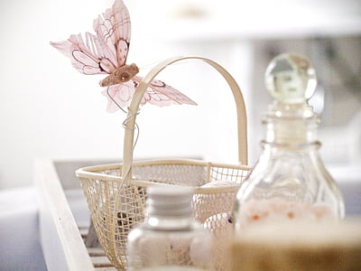 beige basket with butterfly accent thumbnail