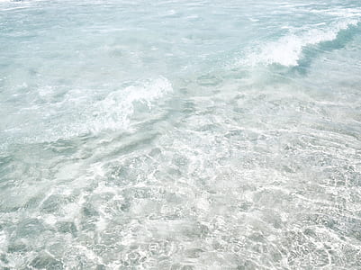 ocean wave with foam at daytime thumbnail