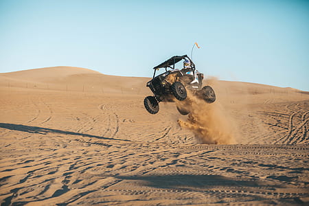 black dune buggy on desert thumbnail