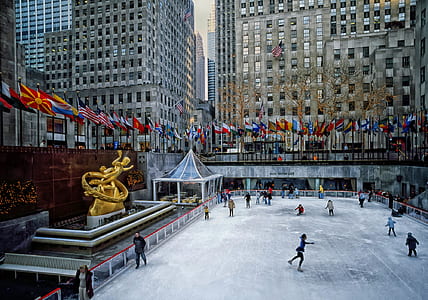 group of people doing ice skating during daytime thumbnail