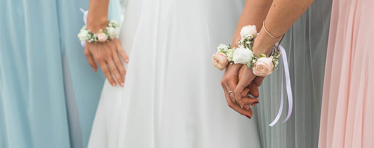 women with flower bracelets thumbnail