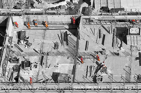 aerial photography of person working to build a building thumbnail