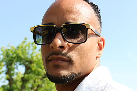 man wearing black wayfarer sunglasses thumbnail