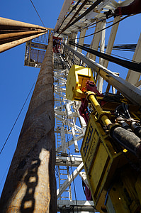 low-angle photography of metal platform during daytime thumbnail