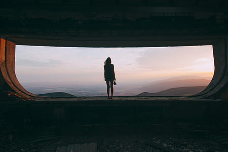 silhouette of woman during golden hour thumbnail