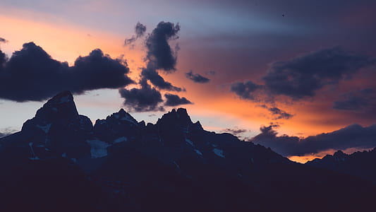 silhouette of mountains during twilight thumbnail