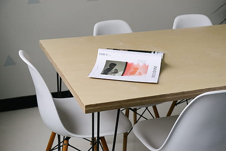 opened paged book on table thumbnail