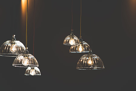 turned on white pendant lamps thumbnail