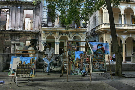paintings on stand outdoors thumbnail